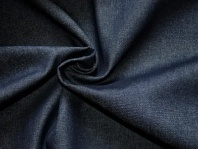 indigo stretch denim fabric in swirl pattern