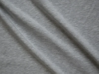 Gray cotton spandex jersey fabric in ripple to show texture