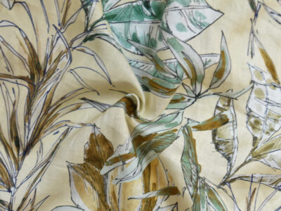 Palm frond print on yellow background midweight linen fabric