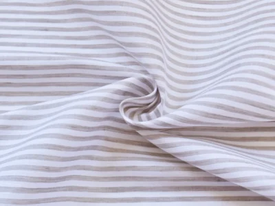 100% linen fabric with thin light beige horizontal stripes